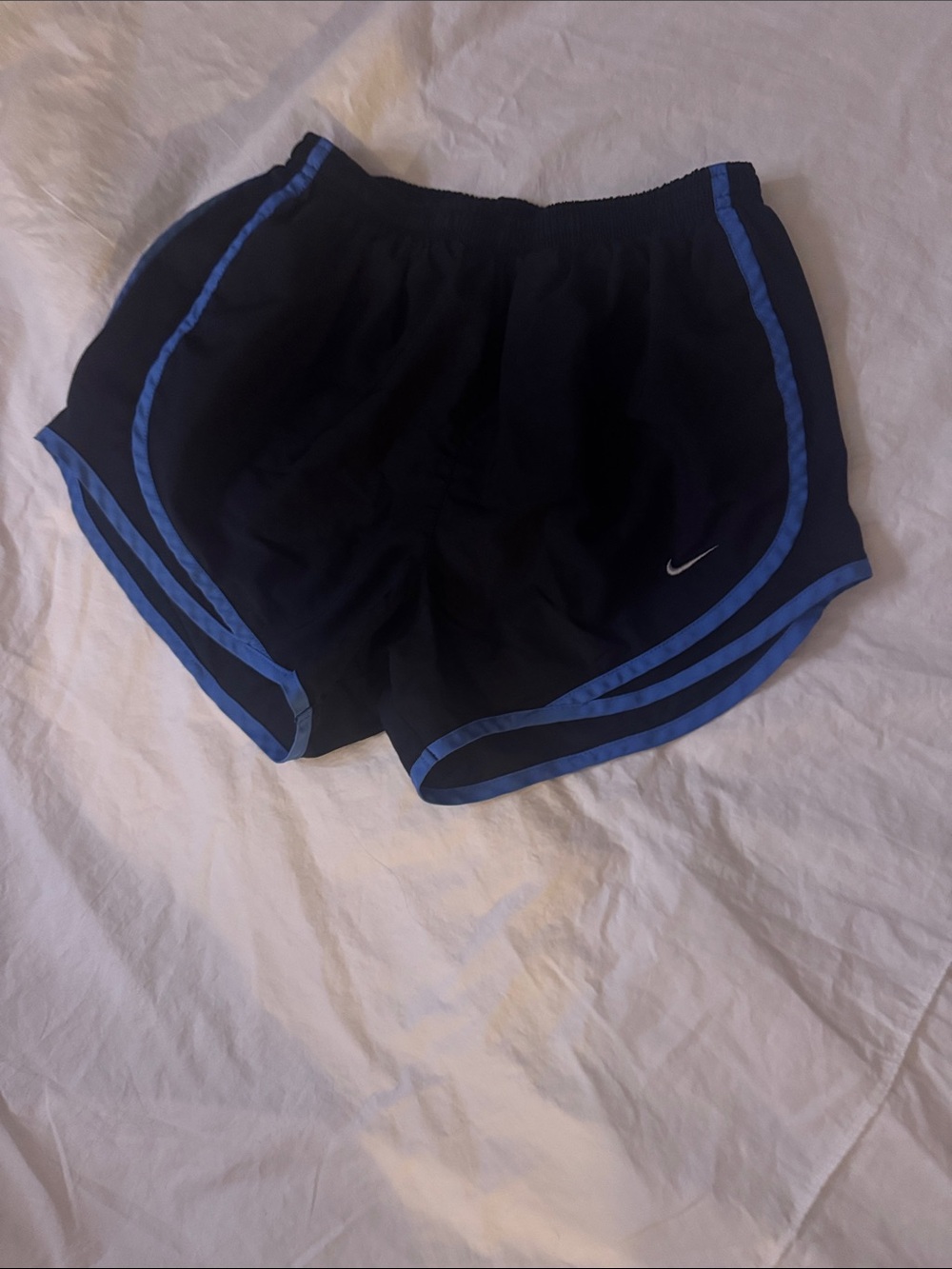 Nike Women’s Black Athletic Shorts with Blue Trim